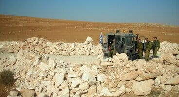 2011-12-20 Settlers' running race in the West Bank causing hours of delay for Palestinians